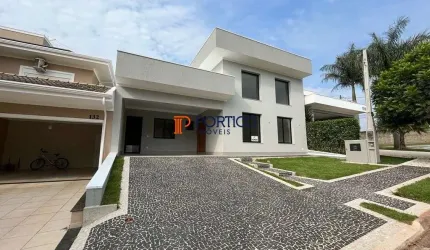 Casa nova em condomínio com três suítes