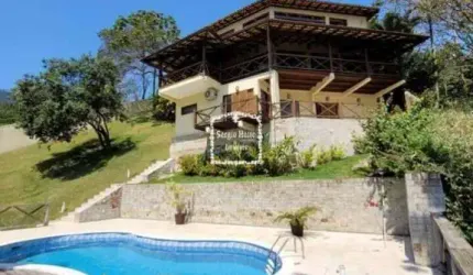 Viva o Paraíso em Ilhabela: Sua Oportunidade em uma Casa de Alto Padrão com Vista para o Mar