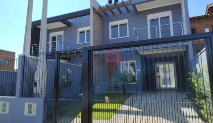 Sobrado com 3 dormitórios à venda, 112 m² por R$ 630.000,00 - Girassol - Gravataí/RS