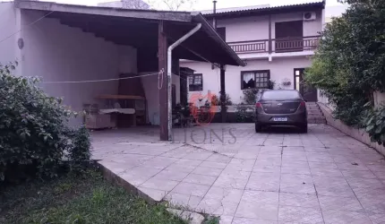 Casa com 3 dormitórios à venda, 140 m² por R$ 690.000,00 - Vera Cruz - Gravataí/RS