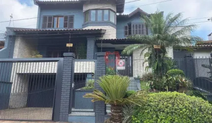 Sobrado com 3 dormitórios à venda, 330 m² por R$ 1.750.000,00 - Dom Feliciano - Gravataí/RS