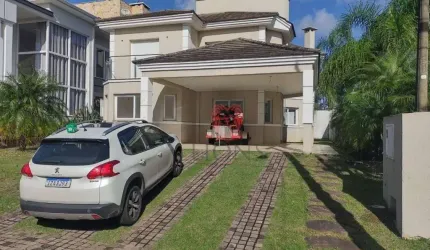Casa com 3 dormitórios, 220 m² - venda por R$ 2.200.000,00 ou aluguel por R$ 10.178,52 - Alphaville - Gravataí/RS