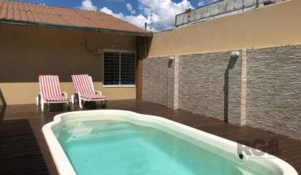 Casa com 3 dormitórios no bairro Rubem Berta