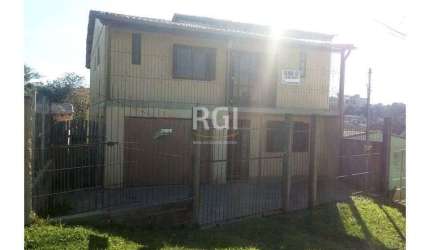 Casa para Venda - 634m², 2 dormitórios, sendo 1 suites, 3 vagas - Lomba do Pinheiro