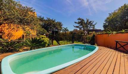 Casa de 3 dormitórios, no Bairro Ponta Grossa - Porto Alegre