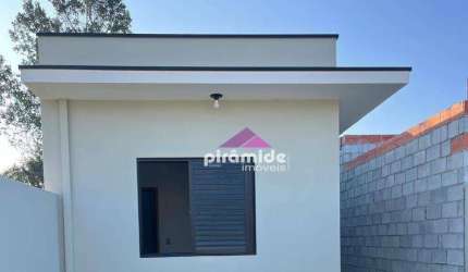 Casa com 2 dormitórios à venda, 63 m² por R$ 320.000,00 - Balneário dos Golfinhos - Caraguatatuba/SP
