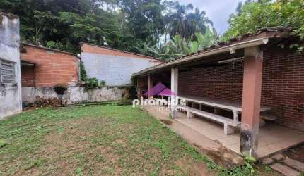 Casa com 3 dormitórios à venda, 214 m² por R$ 590.000,00 - Massaguaçu - Caraguatatuba/SP