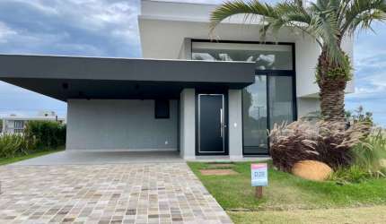 Casa em condomínio fechado com 3 quartos à venda na Ipanema, 521, Curumim, Capão da Canoa por R$ 1.990.000