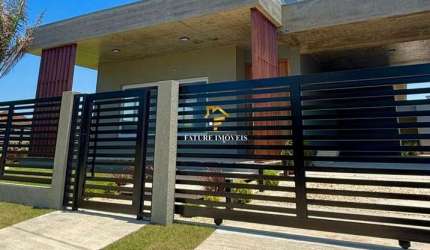 Casa com 3 quartos à venda na Minuano, 100, Curumim, Capão da Canoa por R$ 1.380.000