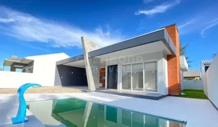 Casa com 3 quartos à venda na Avenida Medeiros de Quadros, 42, Balneário São Jorge, Arroio do Sal, 138 m2 por R$ 850.000