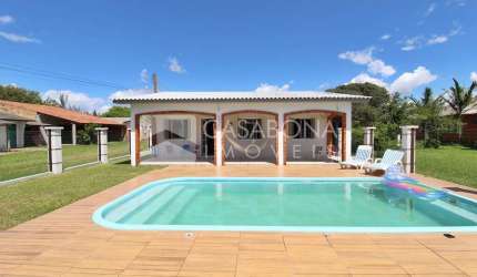 Casa com 3 quartos à venda na Rua das Rosas, 5061, Praia de Bom Jesus, Arroio do Sal por R$ 450.000
