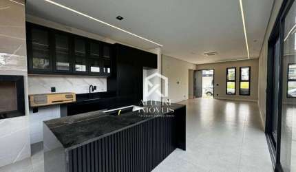 Casa térrea com 3 suítes à venda, 160 m² por R$ 1.250.000 - Condomínio Aruana - São José dos Campos/SP