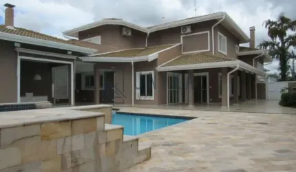 Casa de alto padrão em condomínio no Loteamento Alphaville Campinas para locação: 4 quartos, 4 suítes, 3 salas, 6 banheiros, 4 vagas e 600m².