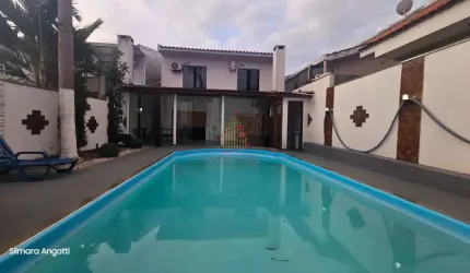 Incrível sobrado com piscina no bairro Canadá - SO641