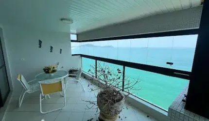 Apartamento com 3 dormitórios para alugar, 184 m² por R$ 11.000,00/ano - Praia das Pitangueiras Frente Mar - Guarujá/SP