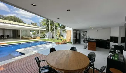 CASA TÉRREA NOVA COM 710M2 A.C. e 1.390m2 A.T.  4 DORMS - 3 SUÍTES - AQUECIMENTO SOLAR