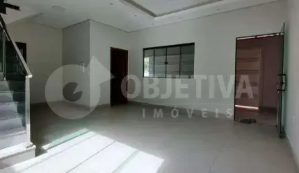Excelente casa duplex estilo sobrado a venda no bairro Santa Mônica em Uberlândia