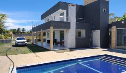Casa de praia com piscina, 03 suítes, em Paripueira, condomínio fechado