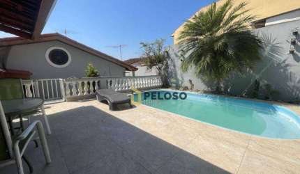Casa térrea à venda 370m2 de área útil /nos fundos uma casa com 110m2, totalizando 4 dormitórios / 1 suíte / 3 vagas de garagem / Palmas do Tremembé