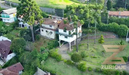 Casa com 7 dormitórios à venda, 502 m² por R$ 1.800.000,00 - Vila Capivari - Campos do Jordão/SP