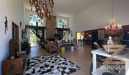 Casa com 4 dormitórios à venda, 315 m² por R$ 3.700.000,00 - Condomínio Recanto do Sol - Campos do Jordão/SP