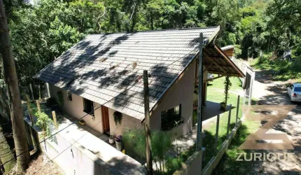 Casa com 3 dormitórios à venda, 190 m² por R$ 900.000,00 - Centro - Campos do Jordão/SP