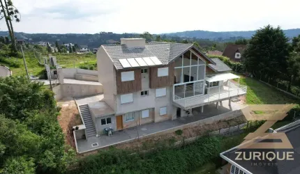 Casa com 4 dormitórios à venda, 330 m² por R$ 3.000.000,00 - Alto Do Capivari - Campos do Jordão/SP