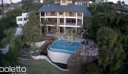 Casa com 4 dormitórios à venda, 1107 m² por R$ 3.700.000,00 - Vila Assunção - Po