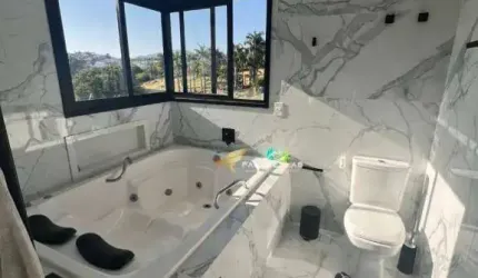Sobrado com 3 dormitórios à venda, 292 m² por R$ 3.100.000,00 - Condomínio Brisas de Jundiaí - Jundiaí/SP