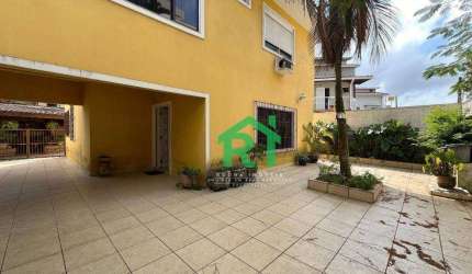 Casa na praia 4 dormitórios à venda, 240 m² por R$ 848.000