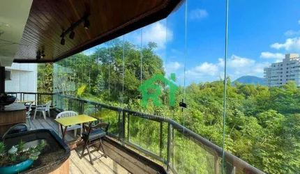 Apartamento à venda na Praia do Tombo I Rocha Imóveis Guarujá.