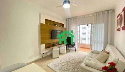 Apartamento à beira mar com 1 dormitório, 1 vaga de garagem - Praia das Pitangueiras, Guarujá/SP