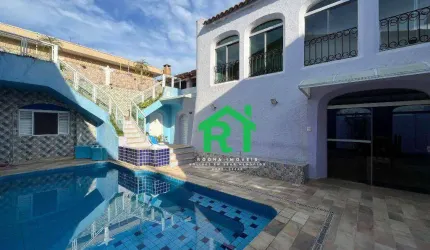 Casa à beira mar com 4 dormitórios (2 suítes), 3 vagas, lazer, Balneário Praia do Pernambuco, Guarujá/SP