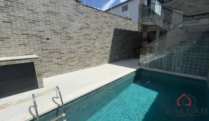 Casa com 3 quartos à venda na Delphin Moreira, 99, Embaré, Santos por R$ 1.800.000