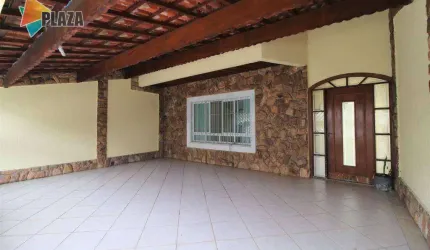 Casa com 3 dormitórios à venda, 157 m² por R$ 910.000,00 - Vila Guilhermina - Praia Grande/SP