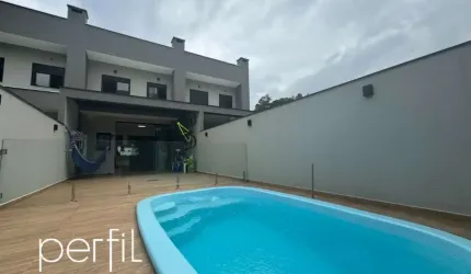 Sobrado a venda 100% MOBILIADO com três quartos sendo uma suíte no bairro Santo Antônio - Joinville/ SC