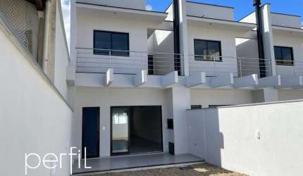 Sobrado à venda em Joinville-SC, Costa E Silva: 3 quartos, 1 suíte, 1 sala, garagem e 143,27m² de área.