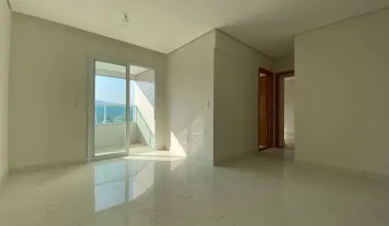 Apartamento com 2 dormitórios à venda, 70 m² por R$ 520.000,00 - Caiçara - Praia Grande/SP