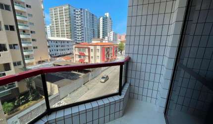 Apartamento com 2 dormitórios para alugar, 84 m² por R$ 3.300,02/mês - Vila Guilhermina - Praia Grande/SP
