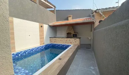 Casa com 2 dormitórios à venda, 112 m² por R$ 720.000,00 - Vila Caiçara - Praia Grande/SP
