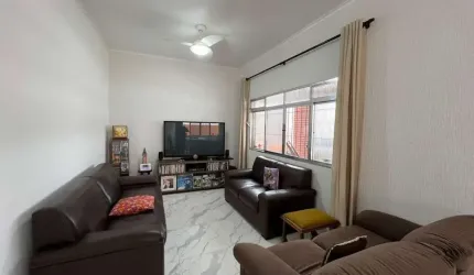 Casa com 3 dormitórios à venda, 165 m² por R$ 565.000,00 - Caiçara - Praia Grande/SP