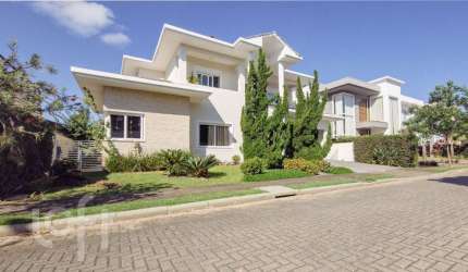 Casa em condomínio fechado com 4 quartos à venda na Rodovia Doutor Antônio Luiz Moura Gonzaga, 3825, Rio Tavares, Florianópolis, 328 m2 por R$ 4.999.000
