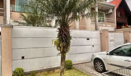 Casa com 3 quartos à venda no Bacacheri, Curitiba  por R$ 1.199.000