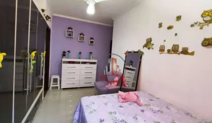 Casa com 2 dormitórios à venda por R$ 495.000 - Caiçara - Praia Grande/SP