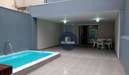 Casa com 3 dormitórios à venda, 129 m² por R$ 625.000,00 - Caiçara - Praia Grande/SP