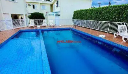 Belo Sobrado em Condomínio Fechado no Bairro Centro em Bertioga com 71m² de Área Construída - 2 Suítes e 2 Vagas de Garagem - Churrasqueira e Piscina