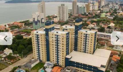 Apartamento à venda em Balneário Piçarras-SC, Itacolomi: 2 quartos, 1 sala, 1 banheiro, 1 vaga - 63,00m² de área.