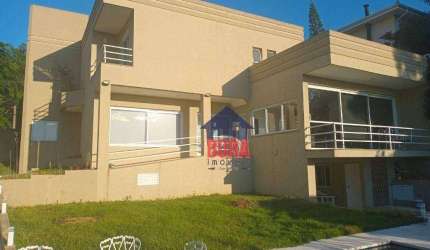 Casa com 3 dormitórios à venda, 420 m² por R$ 2.400.000 - Condomínio Arco Iris - Atibaia/SP