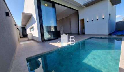 Casa alto padrão no condomínio Arts com três suítes, escritório com lavabo e área gourmet completa.