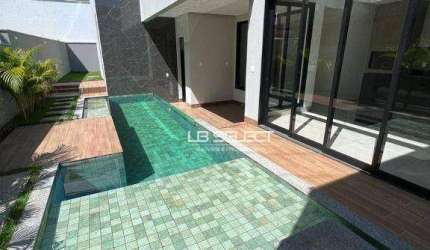 Casa no Condomínio Alphaville I com três suíte e área gourmet completa.